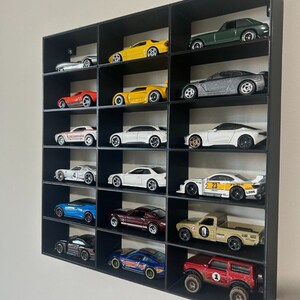 thumbnail image 2 of Hot Wheels 1:64 Car Display Shelf – Holds 5 Cars, Wall-Mount, Black Plastic (14-Car Pack Available) 2 of 3