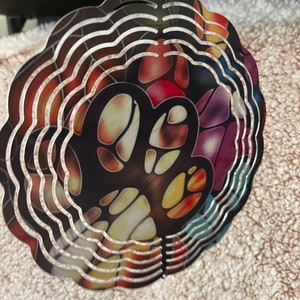 Dog paw print wind spinner