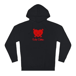 May include: Black hooded sweatshirt with a red heart with a skull and crossbones design and the text "Ruby Gloom" in red.