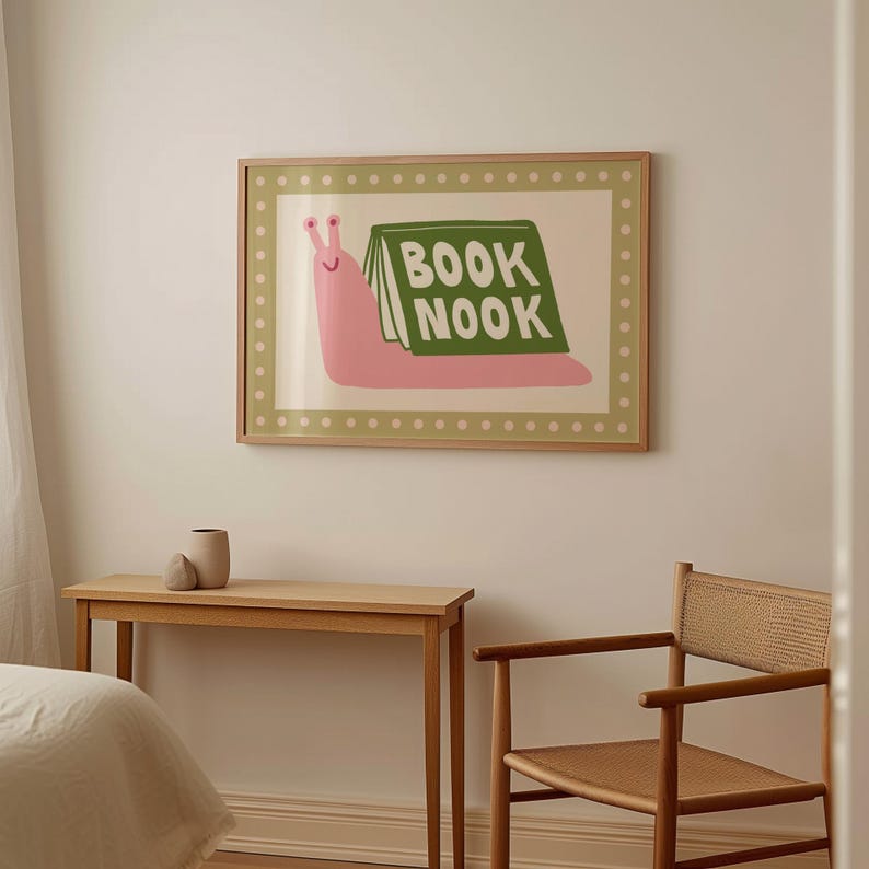 Playful pink book snail illustration with Book Nook text. Contemporary maximalist art print featuring retro-inspired design. Funky bookish wall decor, groovy library art, bibliophile gift print