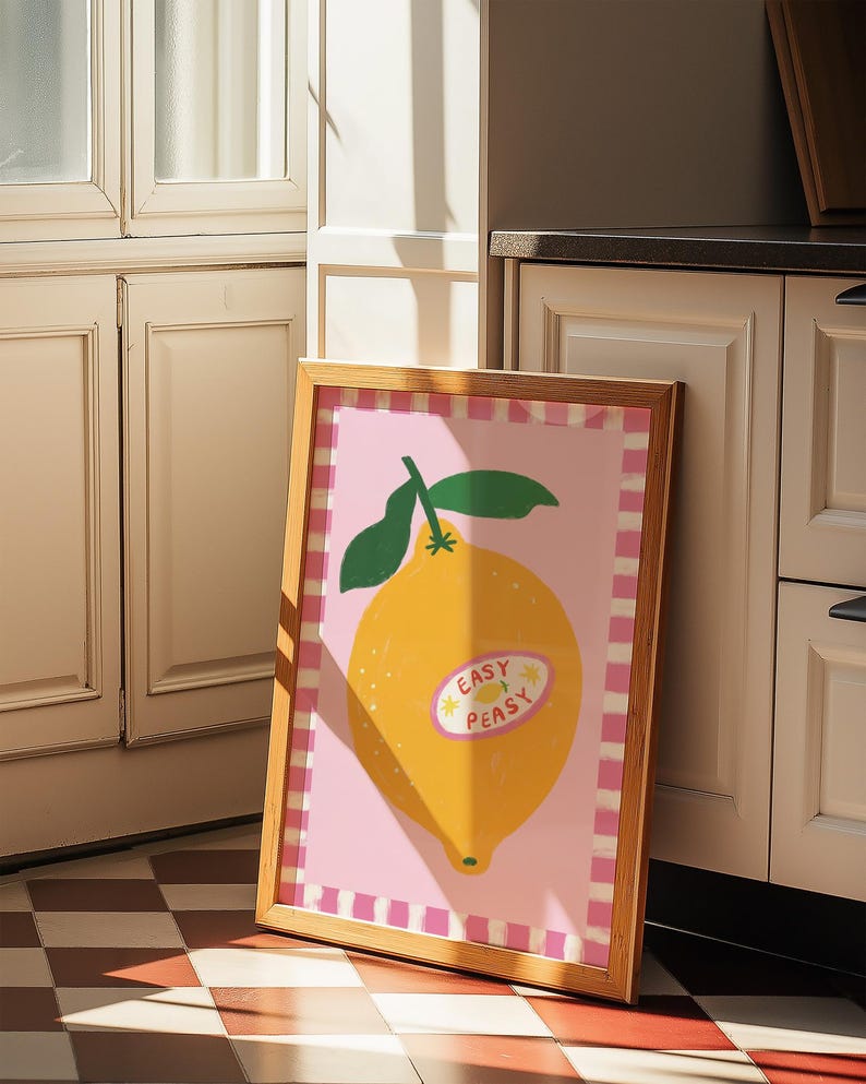Cheerful hand drawn lemon illustration with playful easy peasy typography, bright yellow citrus fruit wall art in dopamine art style, modern kitchen print with quirky lettering and fun fruit doodles, maximalist summer decor featuring bold colors and happy vibes, trendy food art perfect for kitchen gallery wall, retro inspired fruit illustration with positive message, funky home decor with fresh citrus theme