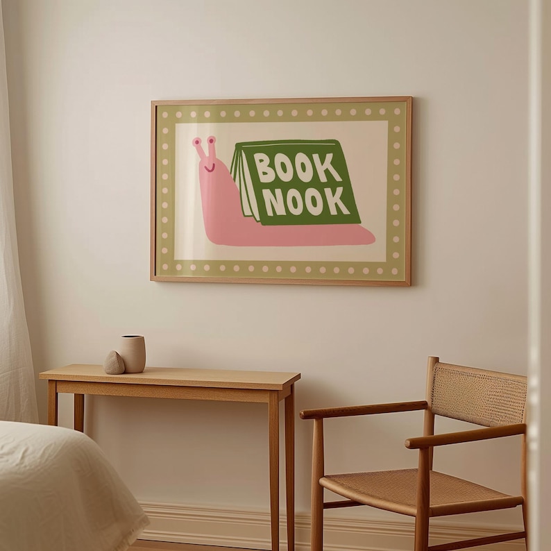 Playful pink book snail illustration with Book Nook text. Contemporary maximalist art print featuring retro-inspired design. Funky bookish wall decor, groovy library art, bibliophile gift print