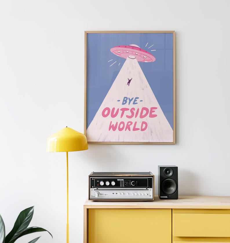 Playful blue illustration of UFO spaceship with light beam abducting stick figure. Text reads bye outside world. Perfect for homebody introvert space lovers funny modern minimalist wall decor cozy room art