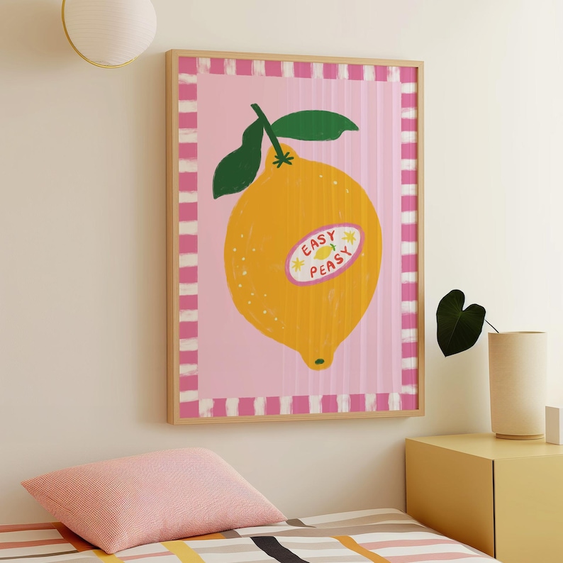 Cheerful hand drawn lemon illustration with playful easy peasy typography, bright yellow citrus fruit wall art in dopamine art style, modern kitchen print with quirky lettering and fun fruit doodles, maximalist summer decor featuring bold colors and happy vibes, trendy food art perfect for kitchen gallery wall, retro inspired fruit illustration with positive message, funky home decor with fresh citrus theme