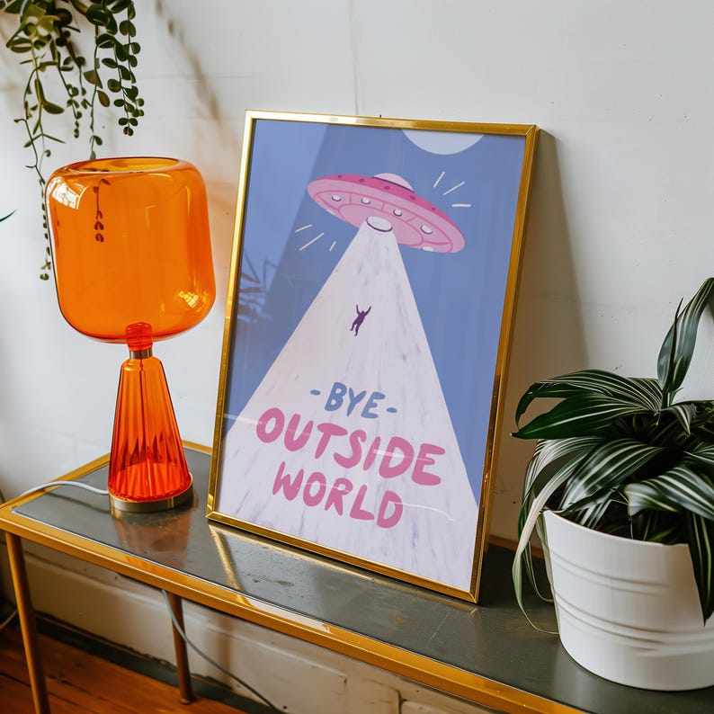 Playful blue illustration of UFO spaceship with light beam abducting stick figure. Text reads bye outside world. Perfect for homebody introvert space lovers funny modern minimalist wall decor cozy room art