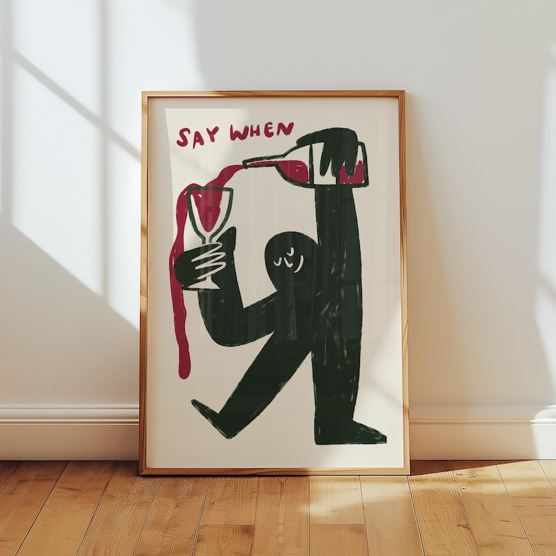 Illustration of a cute character pouring wine into a glass, wine overflowing, with hand lettered text saying when in fun typography. Perfect as kitchen wall art decoration, funny bar room decor, wine cellar artwork. Quirky illustration style with modern aesthetic, hand drawn wine art for home bar. Makes great housewarming present, wine enthusiast present, birthday gift for best friend who loves wine. Funky wine themed home decor that brings personality to kitchen, dining room, or wine room.