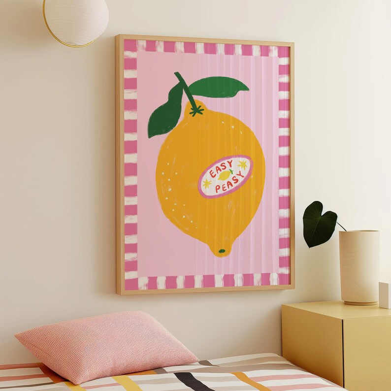 Cheerful hand drawn lemon illustration with playful easy peasy typography, bright yellow citrus fruit wall art in dopamine art style, modern kitchen print with quirky lettering and fun fruit doodles, maximalist summer decor featuring bold colors and happy vibes, trendy food art perfect for kitchen gallery wall, retro inspired fruit illustration with positive message, funky home decor with fresh citrus theme