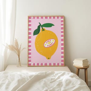 Cheerful hand drawn lemon illustration with playful easy peasy typography, bright yellow citrus fruit wall art in dopamine art style, modern kitchen print with quirky lettering and fun fruit doodles, maximalist summer decor featuring bold colors and happy vibes, trendy food art perfect for kitchen gallery wall, retro inspired fruit illustration with positive message, funky home decor with fresh citrus theme