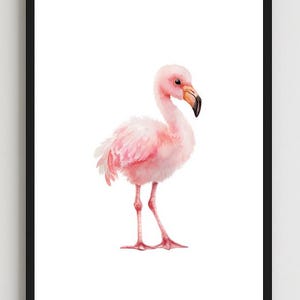 May include: A framed watercolor print of a pink flamingo. The bird is depicted standing with its head turned, showcasing its pink feathers, legs, and beak. The artwork is set against a white background, framed in black, and suitable for nursery or bedroom decor.