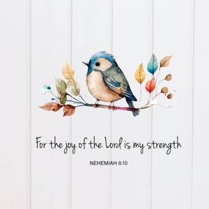 Könnte beinhalten: Ein Aquarellbild eines blauen Vogels, der auf einem Zweig mit bunten Blättern sitzt. Der Text "For the joy of the Lord is my strength" steht unter dem Vogel, darunter die Bibelstelle "NEHEMIAH 8:10".