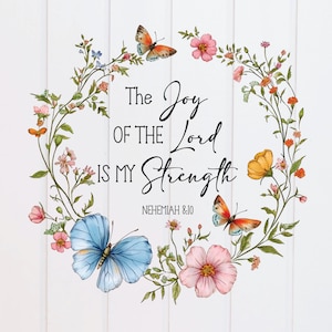 May include: A floral wreath design with butterflies and flowers in shades of pink, orange, and blue. The text "The Joy of the Lord is My Strength" is displayed in elegant script, with the reference "NEHEMIAH 8:10" below.