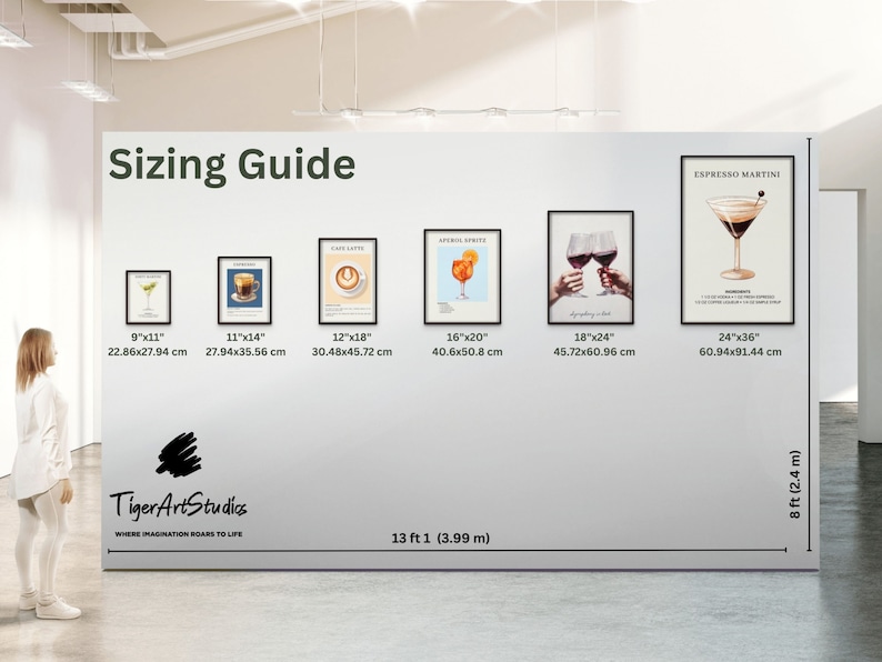 May include: Sizing guide for art prints with different sizes and dimensions. The prints feature various beverages, including cocktails, coffee, and Aperol Spritz. The sizes are listed in inches and centimeters. The guide is displayed on a white wall with a black frame around each print.