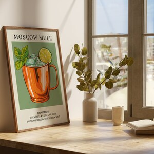 May include: A printable poster with a vintage illustration of a Moscow Mule cocktail in a copper mug. The poster has a green background and includes the ingredients: 2 oz vodka, 1/2 oz lime juice, 6 oz ginger beer, lime wheel, and mint.