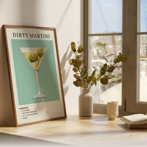 Puede incluir: Una impresi&oacute;n enmarcada con una est&eacute;tica vintage que presenta una copa de martini con aceitunas y el texto "Dirty Martini". La impresi&oacute;n incluye una lista de ingredientes para el c&oacute;ctel.