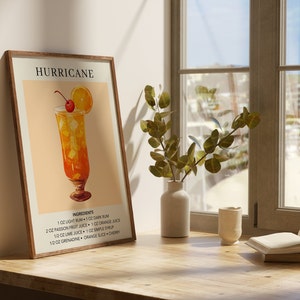May include: A printable poster with a watercolor illustration of a Hurricane cocktail. The poster has a peach background and the text "HURRICANE" in black at the top. The ingredients for the cocktail are listed below the illustration.