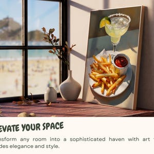 May include: A framed painting of a glass of margarita with a lime wedge and french fries with ketchup on a white plate. The painting is on a wooden surface with a window and plants in the background.