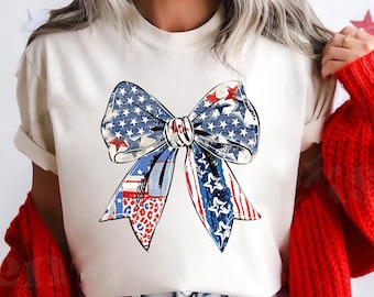 Camisa com bandeira americana Comfort Colors® Coquette, camisa de 4 de julho, camisa com laço dos EUA, camiseta de 4 de julho, camisa patriótica feminina, vermelha, branca e azul