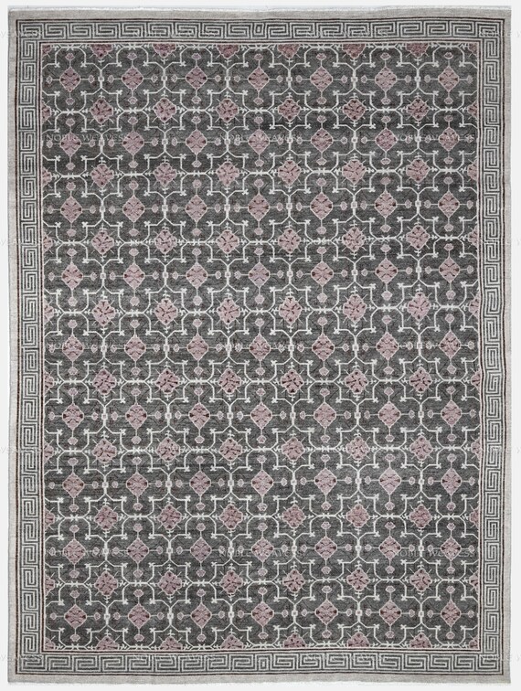 Hand-knotted grey pink rug with geometric lattice and Greek key border – great for modern living rooms, studies, or gallery-style spaces