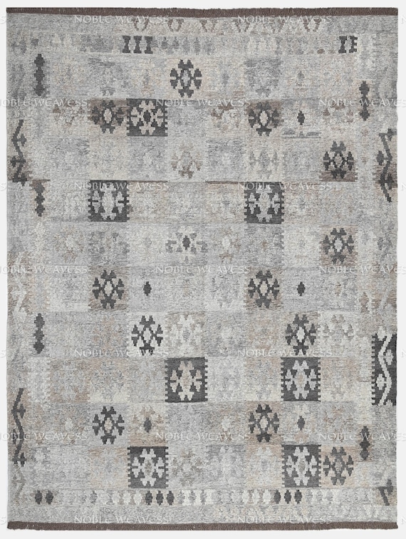 Hand-woven tribal design rug in soft greys and charcoals – a perfect blend of tradition and modern elegance for living rooms and lounges