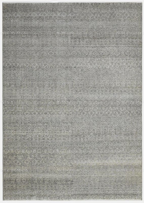 Hand-knotted grey tone rug with faded vintage texture and subtle floral hints – perfect for minimalist, transitional, and modern interiors