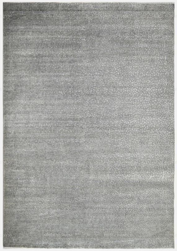 Hand-knotted grey rug with soft faded texture and low contrast floral pattern – ideal for minimalist bedrooms, offices, and calm decor Rug