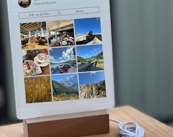 May include: A frosted acrylic display featuring a social media profile with the text "ChainsOnly" and a website address. The display is mounted on a wooden base and includes a USB cable and plug.