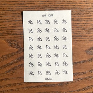 May include: A sheet of white paper with 25 black and white running shoe icons. The icons are arranged in five rows of five. The text "MINI ICON" is at the top of the sheet and the text "OPIGMOM" is at the bottom.