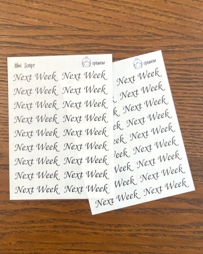 May include: Two sheets of white paper with the phrase "Next Week" repeated multiple times in a cursive script font. The text is printed in black ink. The sheets are labeled "Mini Script" and "opigmom".