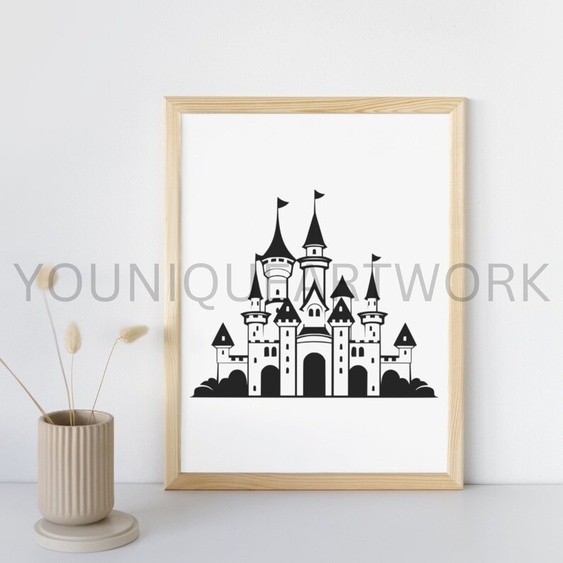 May include: A black and white printable art print of a fairytale castle with a wooden frame. The castle has multiple towers and a large arched entrance.