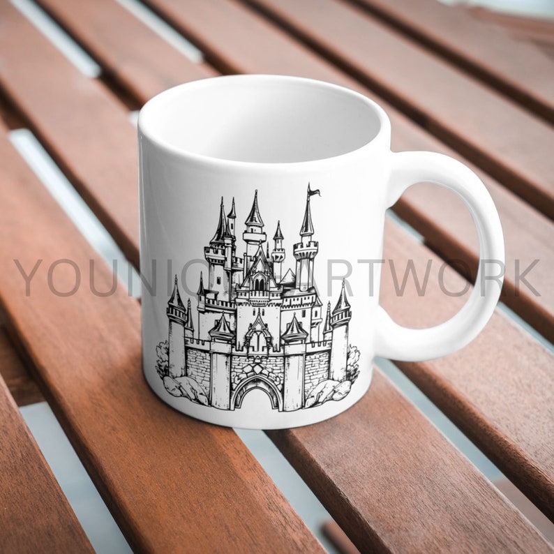 May include: White ceramic mug featuring a black and white illustration of a fairytale castle on the front.