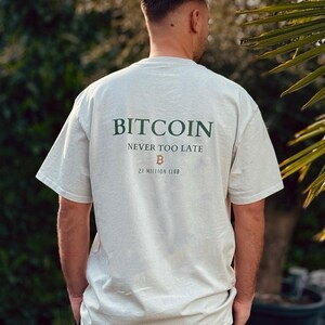 21 MILLION CLUB OVERSIZED T-SHIRT bitcoin t Shirt btc premium Shirt das oversized aus Baumwolle besteht ideal als Geschenk für Bitcoin Fans