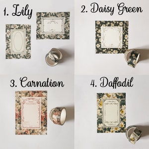 May include: Four sets of floral stationery featuring Lily, Daisy Green, Carnation, and Daffodil designs. Each set includes a rectangular paper sheet with a central frame and a matching roll of decorative tape. The designs display botanical patterns.