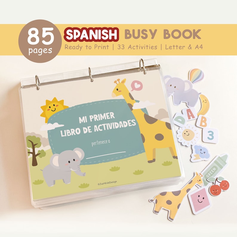 May include: A Spanish language busy book with 85 pages and 33 activities. The cover features a colorful illustration of a giraffe, elephant, and sun. The title of the book is "Mi Primer Libro de Actividades".