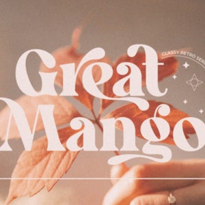 May include: A white font design with the text "Great Mango" in a retro style with a circle around the text that says "Classy Retro Serif with Stylish Alternates". The text is on a background of a blurry image of a hand holding a leaf.