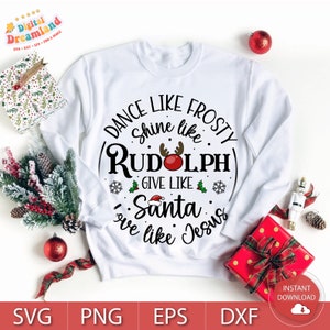 May include: White sweatshirt with a Christmas-themed design that says "Dance like Frosty, Shine like Rudolph, Give like Santa, Love like Jesus".