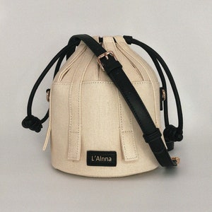 Limited Edition Sustainable Canvas Crossbody Bucket Handbag for Women - Stylish & Sustainable