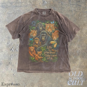 May include: Espresso-colored t-shirt featuring a vibrant jungle scene with gorillas, tigers, monkeys, and a toucan. The shirt includes the text "Life is precious! Take care of it." The shirt is from Old School Cult.
