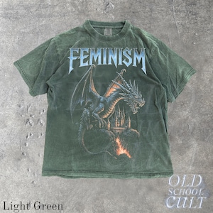 May include: Light green t-shirt with the word "FEMINISM" in a silver, gothic font. A blue dragon graphic is centered below the text, with a castle in the background. The words "OLD SCHOOL CULT" are in the lower right corner.