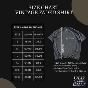 May include: Size chart for a vintage faded shirt in inches. The chart shows the width and length measurements for sizes S, M, L, XL, XXL, and XXXL. The shirt is shown in a dark gray color.