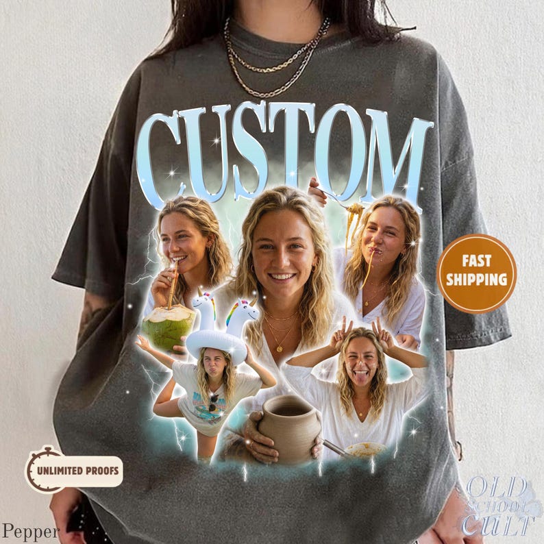 May include: Dark gray t-shirt with the word "CUSTOM" in a light blue, stylized font. The shirt features a collage of photos of a person, with a coconut, pasta, and a unicorn floatie. The shirt has the text "UNLIMITED PROOFS" and "OLD SCHOOL CULT".