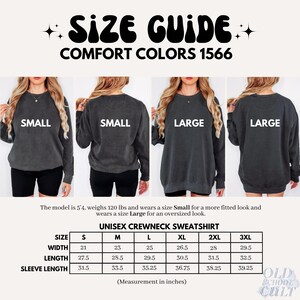 May include: Size guide for unisex crewneck sweatshirts. The image shows a size chart with measurements in inches, and models wearing small and large sweatshirts. The text reads "SIZE GUIDE COMFORT COLORS 1566".