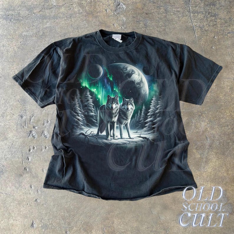 May include: Black t-shirt with a graphic print of two wolves howling at the moon with a green aurora borealis in the background.