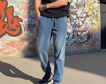 Pantalones deportivos tipo jogger de mezclilla de algodón con lavado vintage para hombre de PlushPunkie