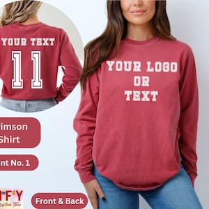 Pode incluir: Camiseta de manga comprida cor carmesim com texto branco que diz "YOUR TEXT" e "11" nas costas e "YOUR LOGO OR TEXT" na frente.