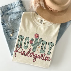Howdy Kindergarten Teacher Shirt, Comfort Color Rodeo Teacher Shirt, Kindergarten Teacher Team Shirt, Western Teacher Gift, Teacher Cowgirl