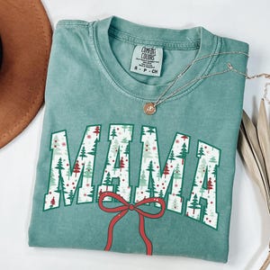 Comfort Colors® Mama Christmas Shirt, Merry Mama Holiday Tee, Womens Holiday Party Tshirt, Christmas Pregnancy Reveal, Festive Gift for Mom