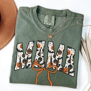 Comfort Colors® Halloween Mama Shirt, Trendy Pumpkin Mom T-Shirt, Cute Fall Mom Tee, Pregnancy Reveal, Gift for New Mom, Halloween Mommy