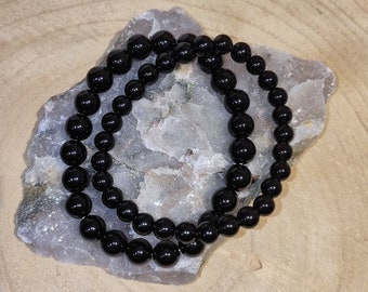 Bracciale in ossidiana nera: protezione, radicamento, chakra della radice, introspezione