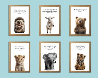 May include: Six framed art prints featuring adorable animal illustrations with inspirational quotes. The prints include a hedgehog, lamb, bear, lion cub, elephant, and tiger cub. Each print has a light brown wooden frame and a white background with black text.