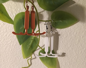 3D-Printed IUD Earrings – Bold Feminist Statement Jewelry in White and Copper Colors